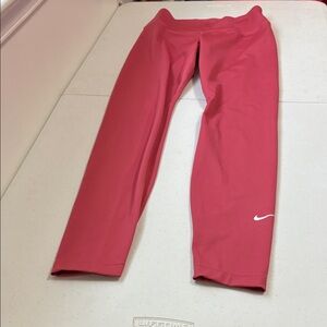 Nike Women’s Coral Pink Athletic Leggings with White Swoosh